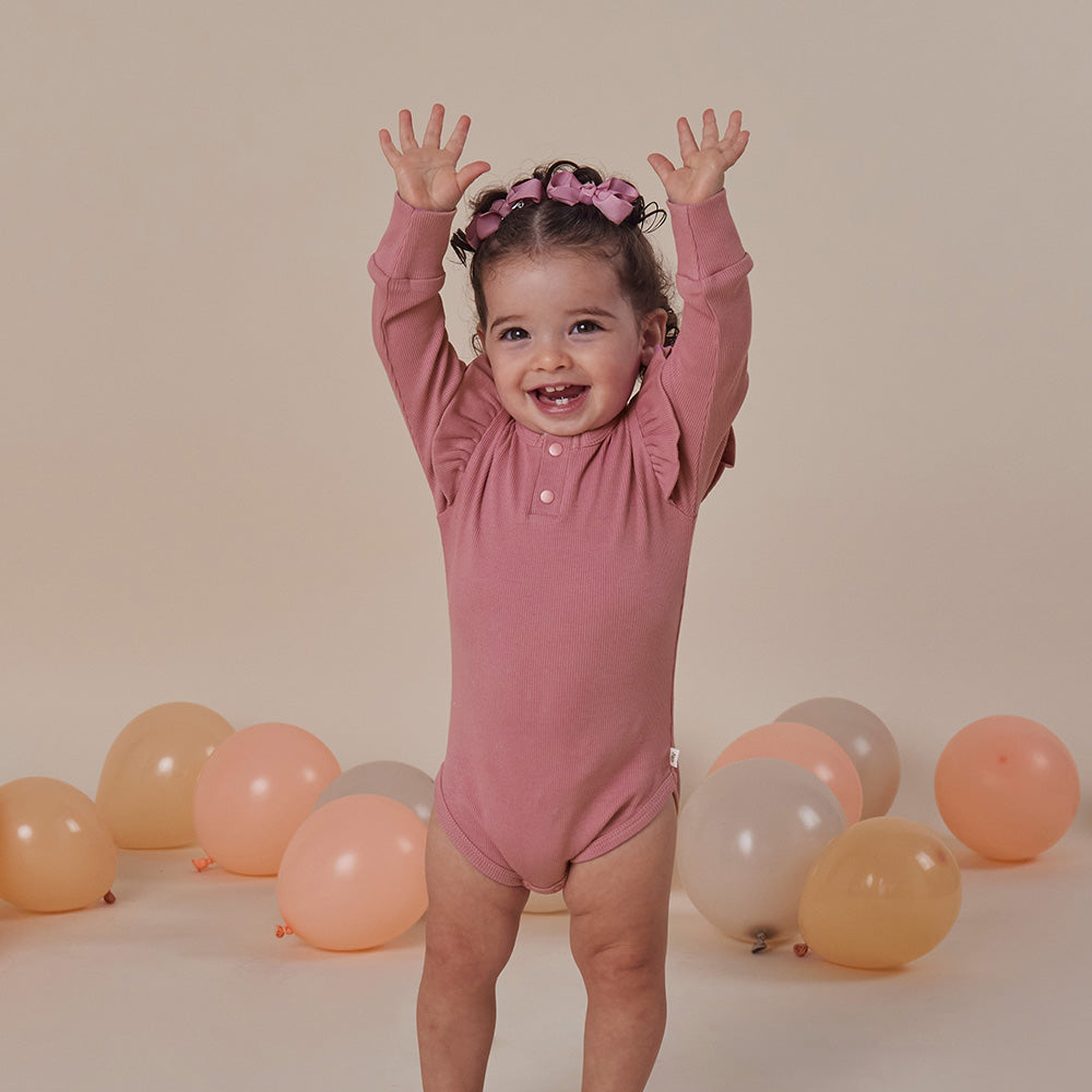 PREORDER: Jewel Pink Rib Long Sleeve Organic Bodysuit with Frill - View 3