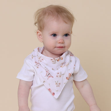Toddler wearing Butterfly Organic Dribble Bib | Snuggle Hunny