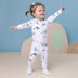 Toddler wearing Ocean Organic Snuggle Sleepsuit Zip Footie | Snuggle Hunny